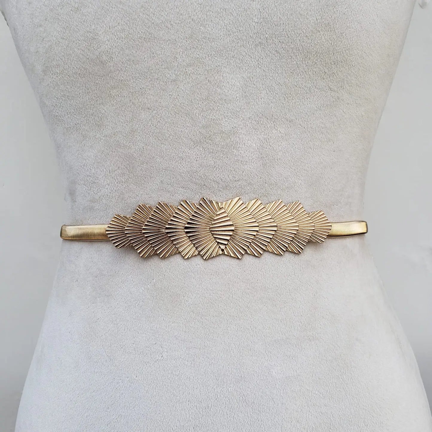 Gold plate stretch belt